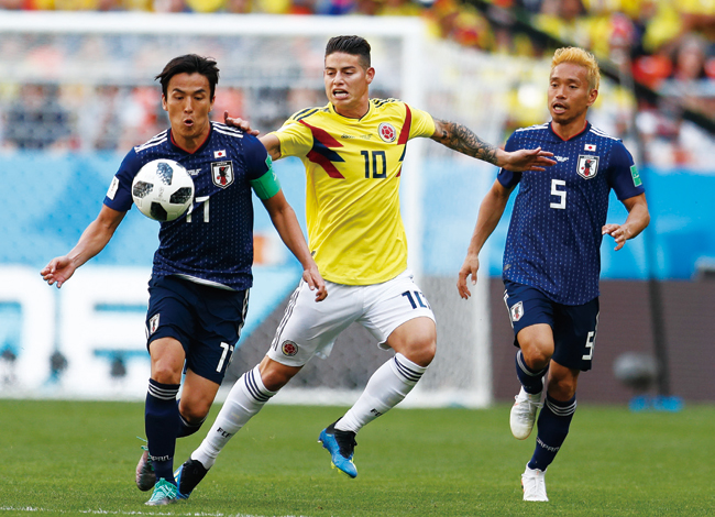 일본은 6월 19일 러시아 월드컵 조별리그 첫 경기인 콜롬비아 전에서 2대1로 승리했다. 이를 원동력으로 16강에 진출했다. 사진 연합뉴스