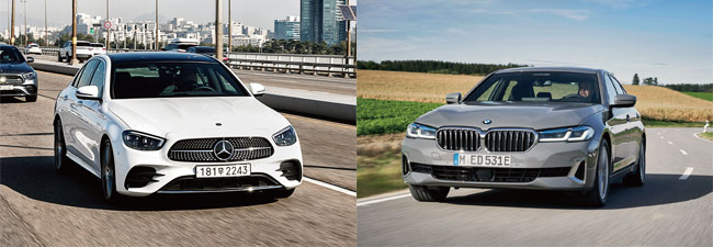 메르세데스-벤츠와 BMW가 각각 회사의 대표 중형 세단인 ‘더 뉴 E-클래스(왼쪽)’와 ‘더 5’를 최근 출시했다. 사진 메르세데스-벤츠 코리아·BMW 코리아